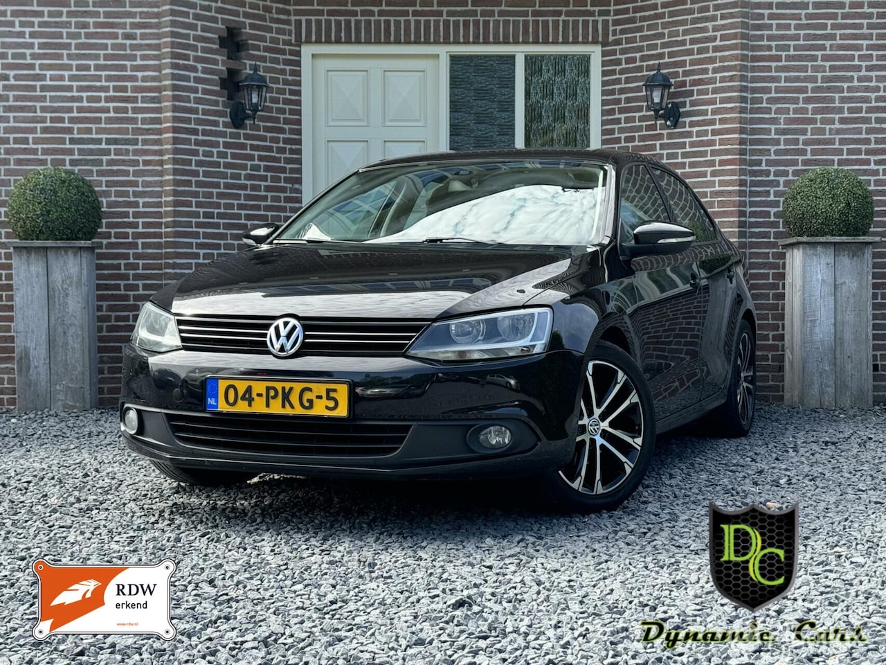 Volkswagen Jetta - 1.2 TSI Comf *Clima *Cruise *Navi *Trekhaak - AutoWereld.nl