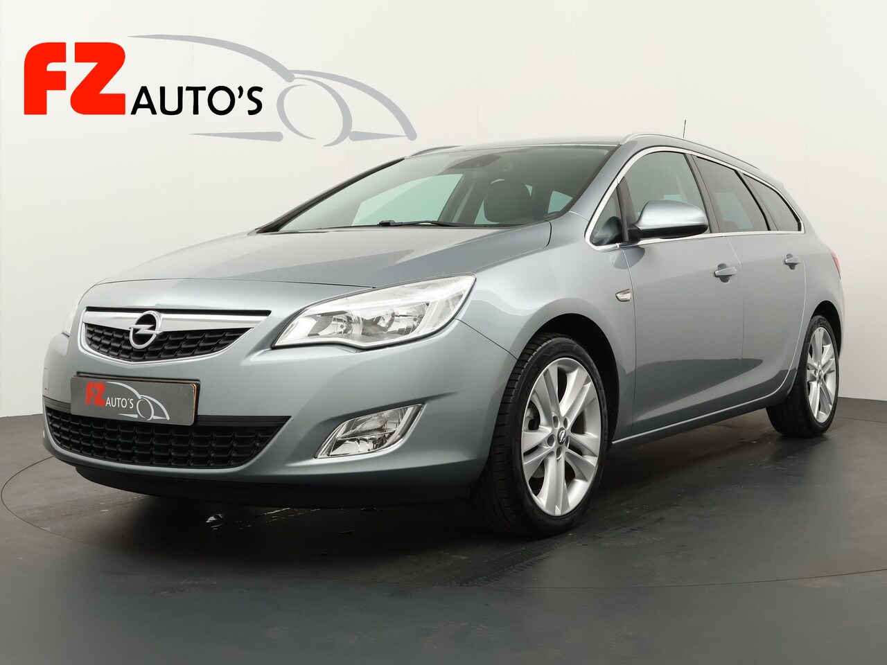 Opel Astra Sports Tourer - 1.4 Turbo Cosmo | Airco | Trekhaak | Cruise Control | - AutoWereld.nl