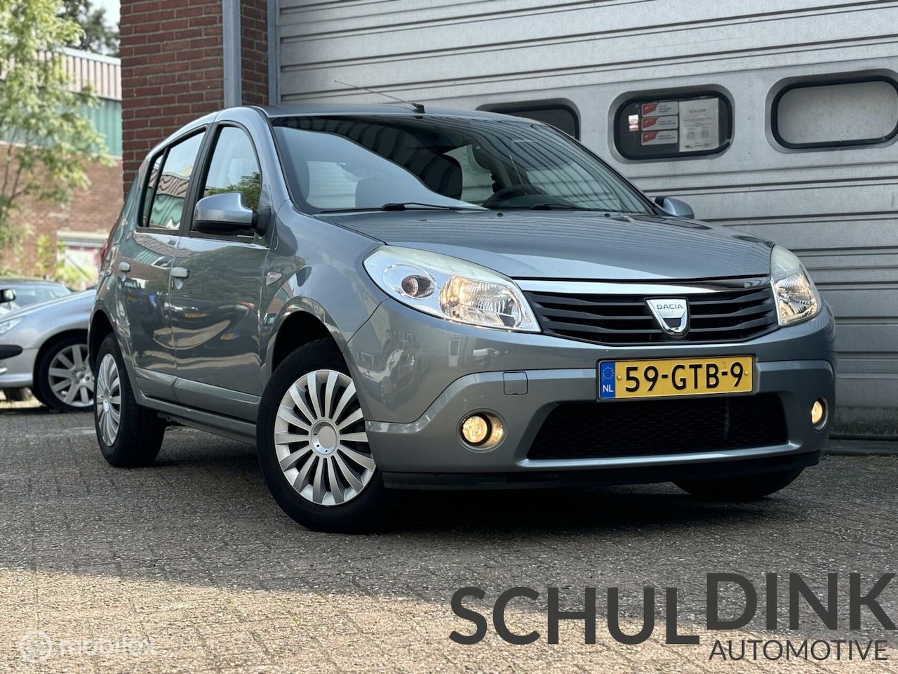 Dacia Sandero - 1.4 Lauréate AIRCO|ELEKTRISCHE RAMEN|5-DEURS - AutoWereld.nl