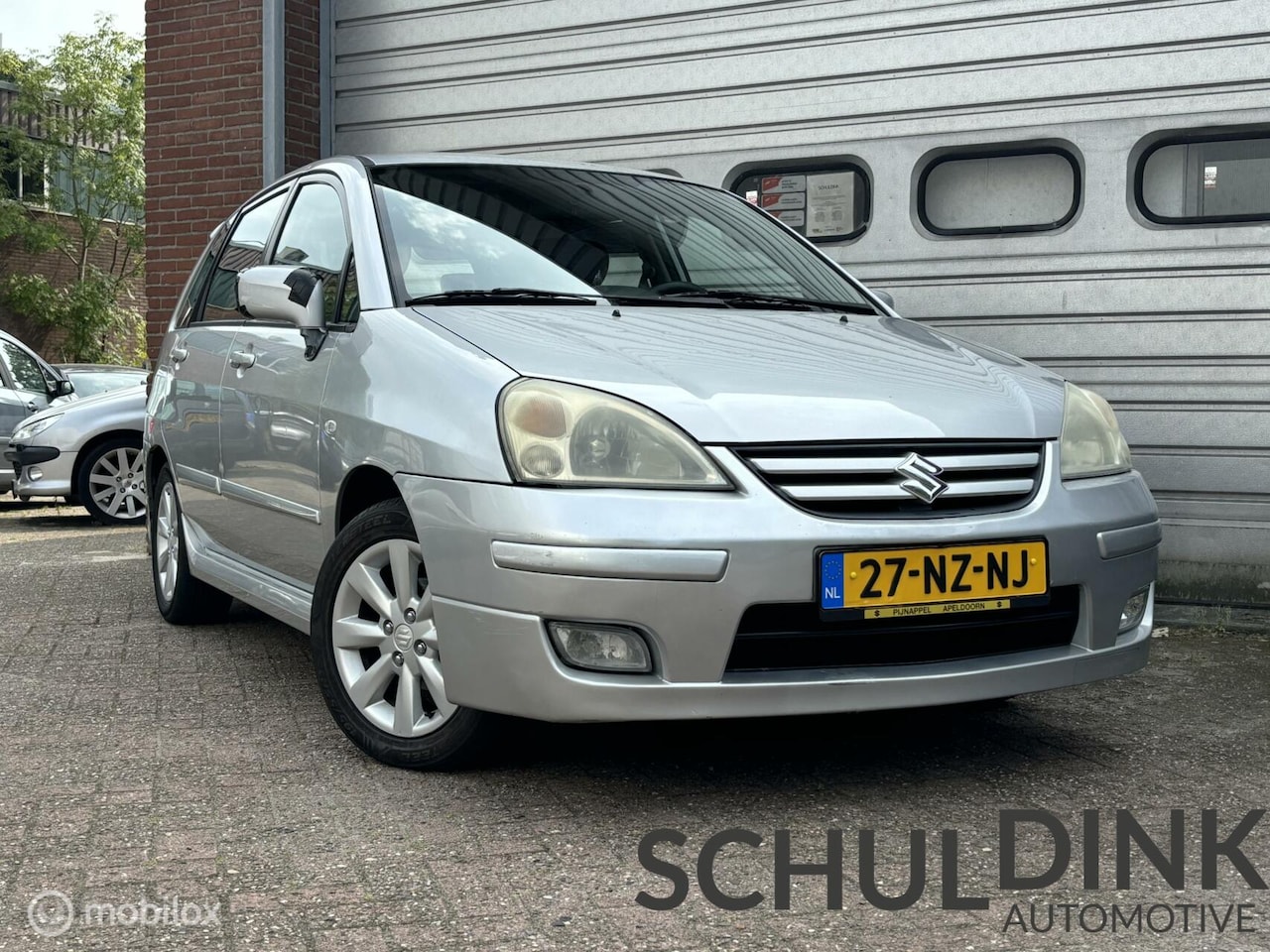 Suzuki Liana - 1.6 Exclusive AIRCO|ELEKTRISCHE RAMEN|HOGE INSTAP - AutoWereld.nl