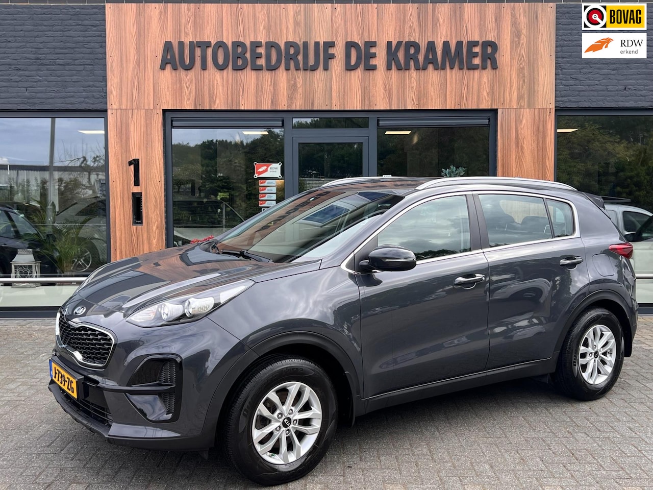 Kia Sportage - 1.6 GDI ComfortLine 1.6 GDI ComfortLine - AutoWereld.nl