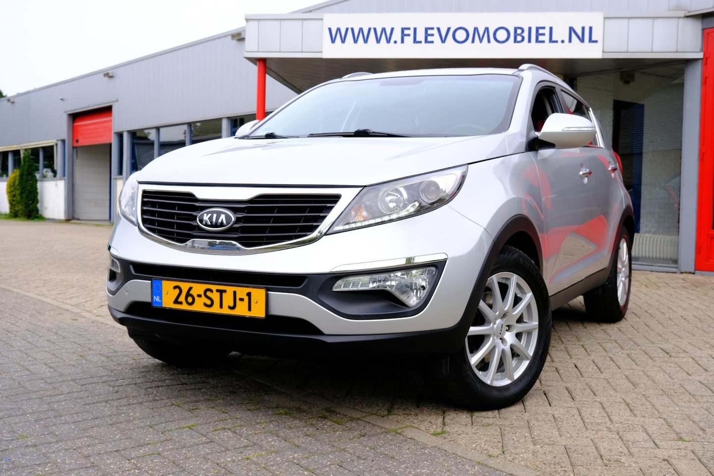 Kia Sportage - 2.0 163pk X-ecutive Plus Pack Aut. Clima|Half Leder|LMV - AutoWereld.nl