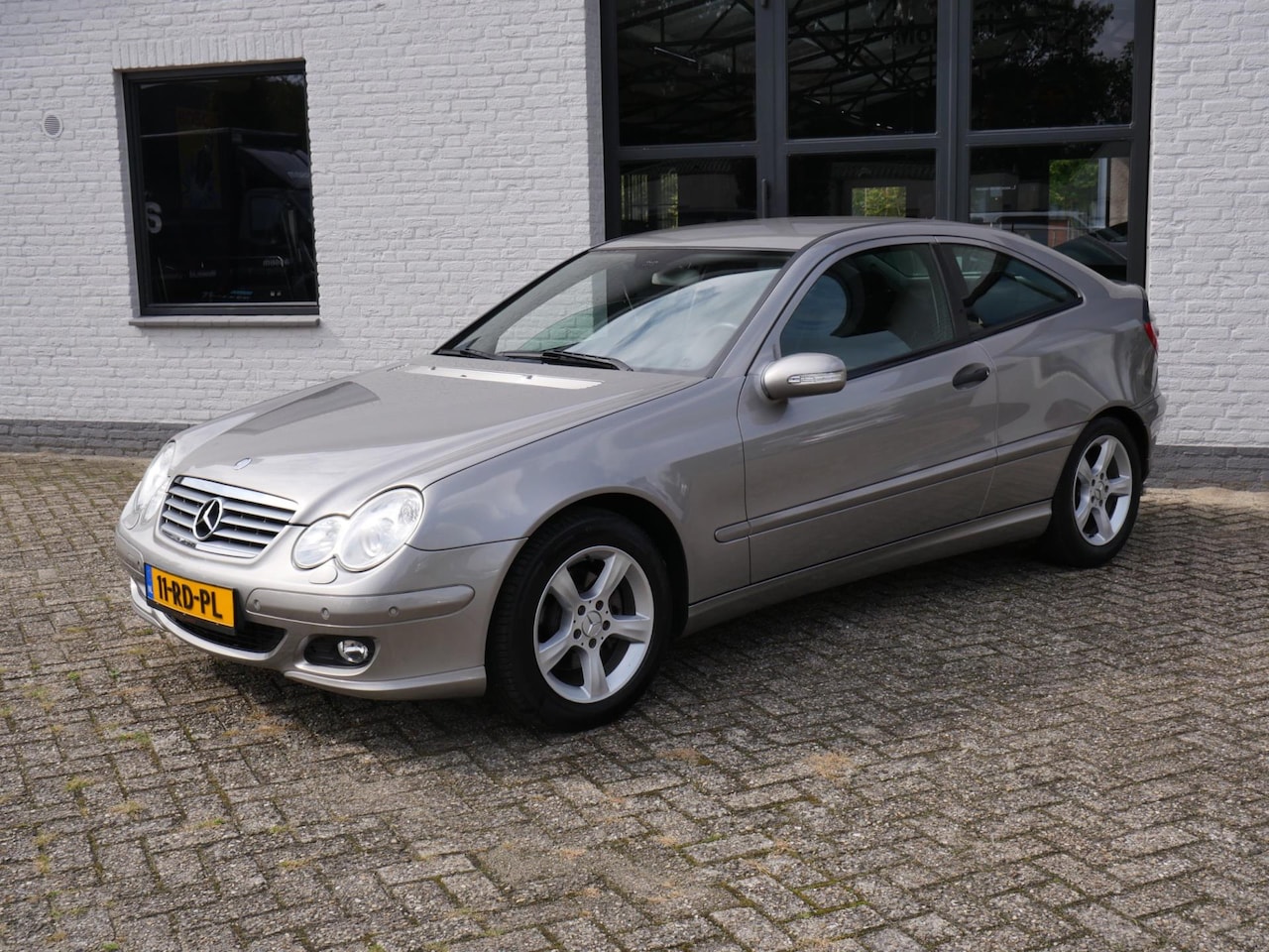 Mercedes-Benz C-klasse Sportcoupé - 180 Kompressor 64.000KM !!! Orig. Nederlands - AutoWereld.nl