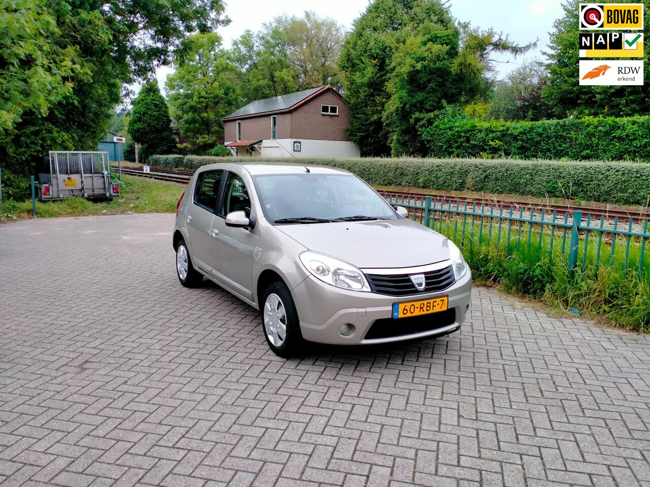 Dacia Sandero - 1.2 Lauréate trekhaak Airco ALLINPRIJS - AutoWereld.nl