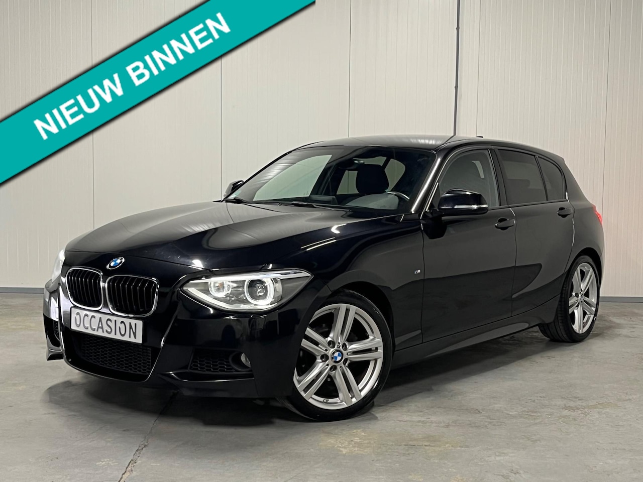 BMW 1-serie - 116i M-Pakket Sport Navi Xenon Clima Pdc Cruise 18" - AutoWereld.nl