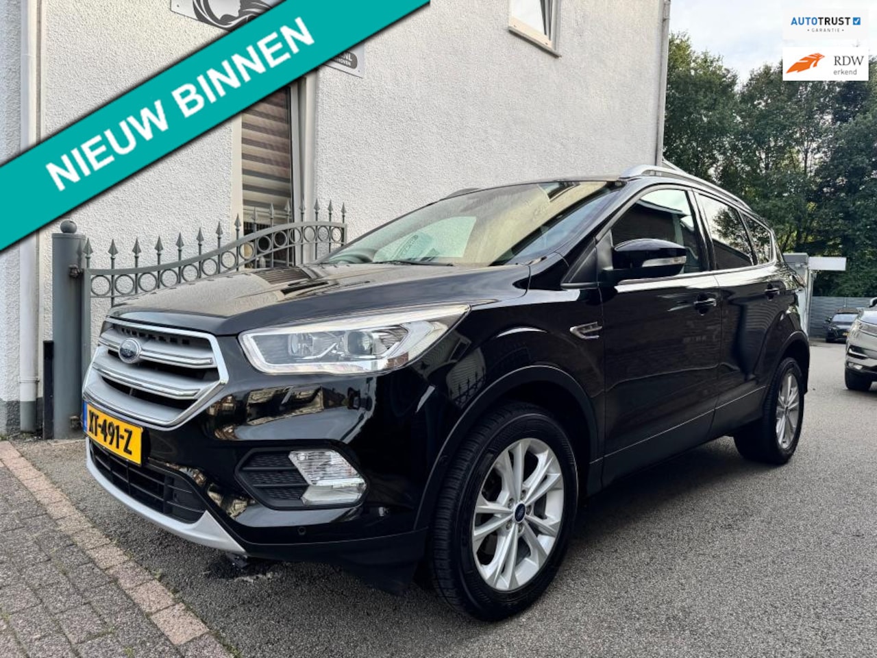 Ford Kuga - 1.5 EcoBoost ST Line | Cruise | Clima | Stoelverwarming | Trekhaak | Vol opties - AutoWereld.nl