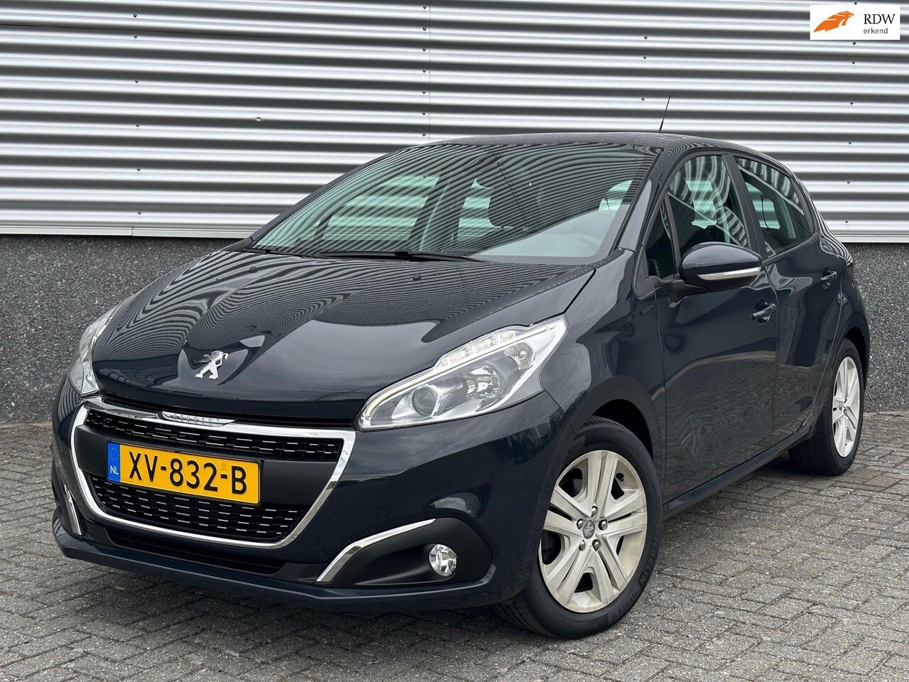 Peugeot 208 - 1.2 PureTech Signature Navi Cruise org-NL - AutoWereld.nl