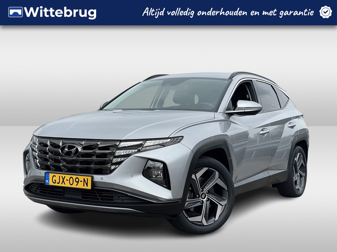 Hyundai Tucson - 1.6 T-GDI PHEV Comfort 4WD | Adaptive Cruise Control | Navigatiesysteem | Stoelverwarming - AutoWereld.nl