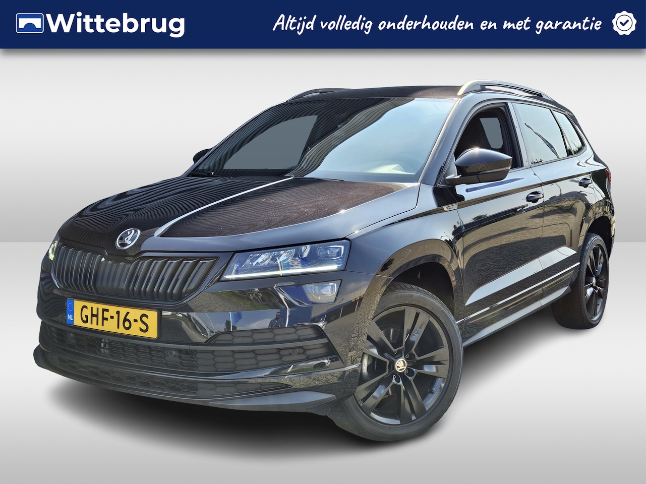 Skoda Karoq - 1.5 TSI ACT Sportline Business Black Edition Automaat | Navigatie | Adaptive Cruise Contro - AutoWereld.nl