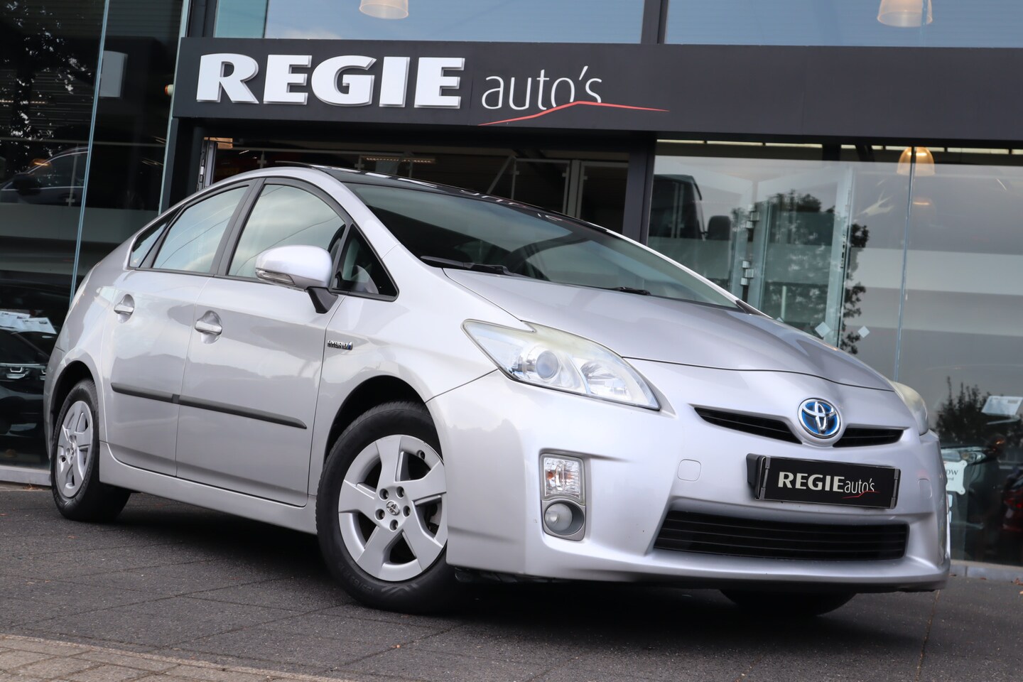 Toyota Prius - 1.8 Aspiration Schuifdak HuD JBL Afn. TH - AutoWereld.nl