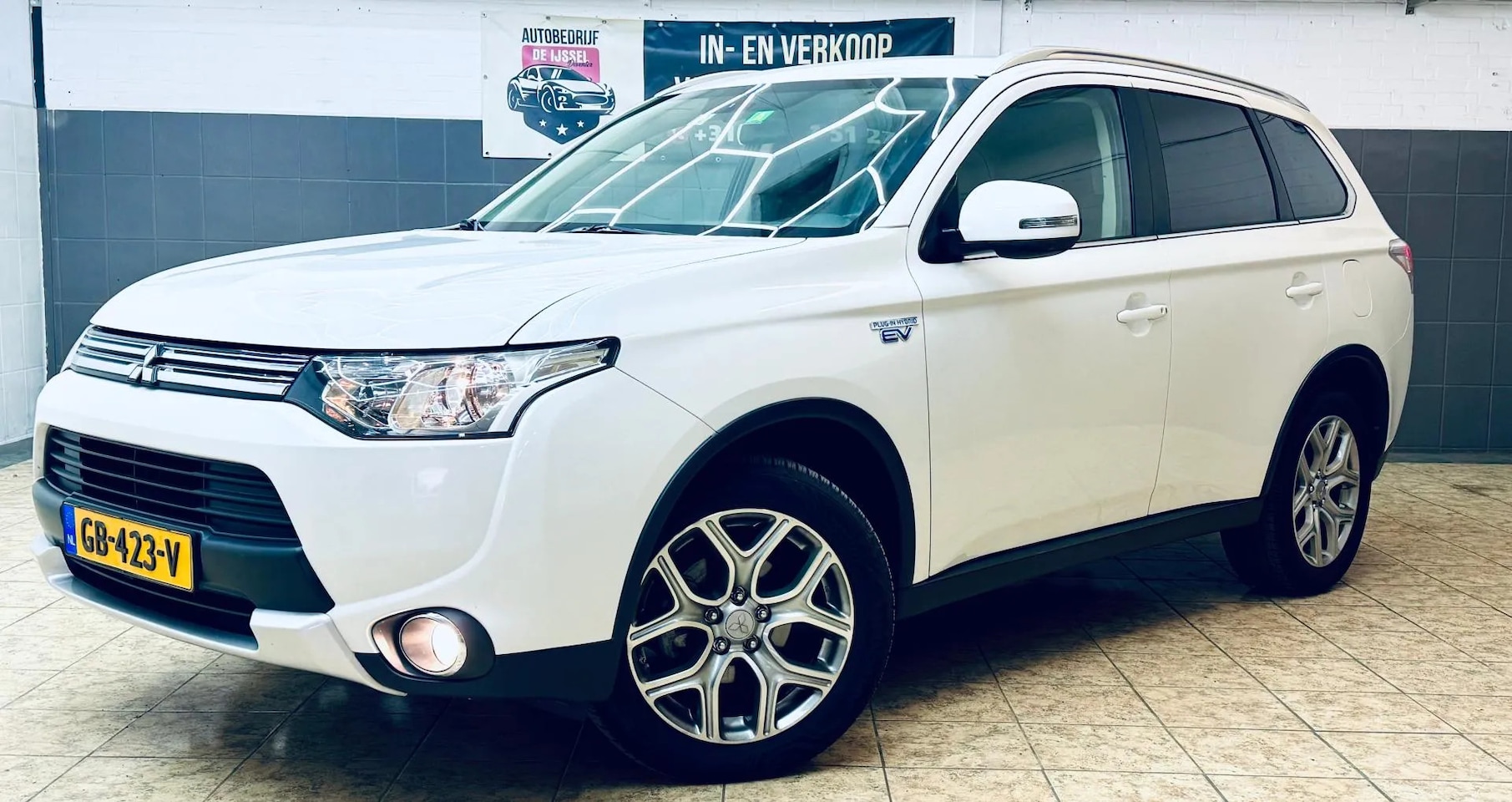 Mitsubishi Outlander - 2.0 PHEV Business Edition X-Line 2.0 PHEV Business Edition X-Line - AutoWereld.nl