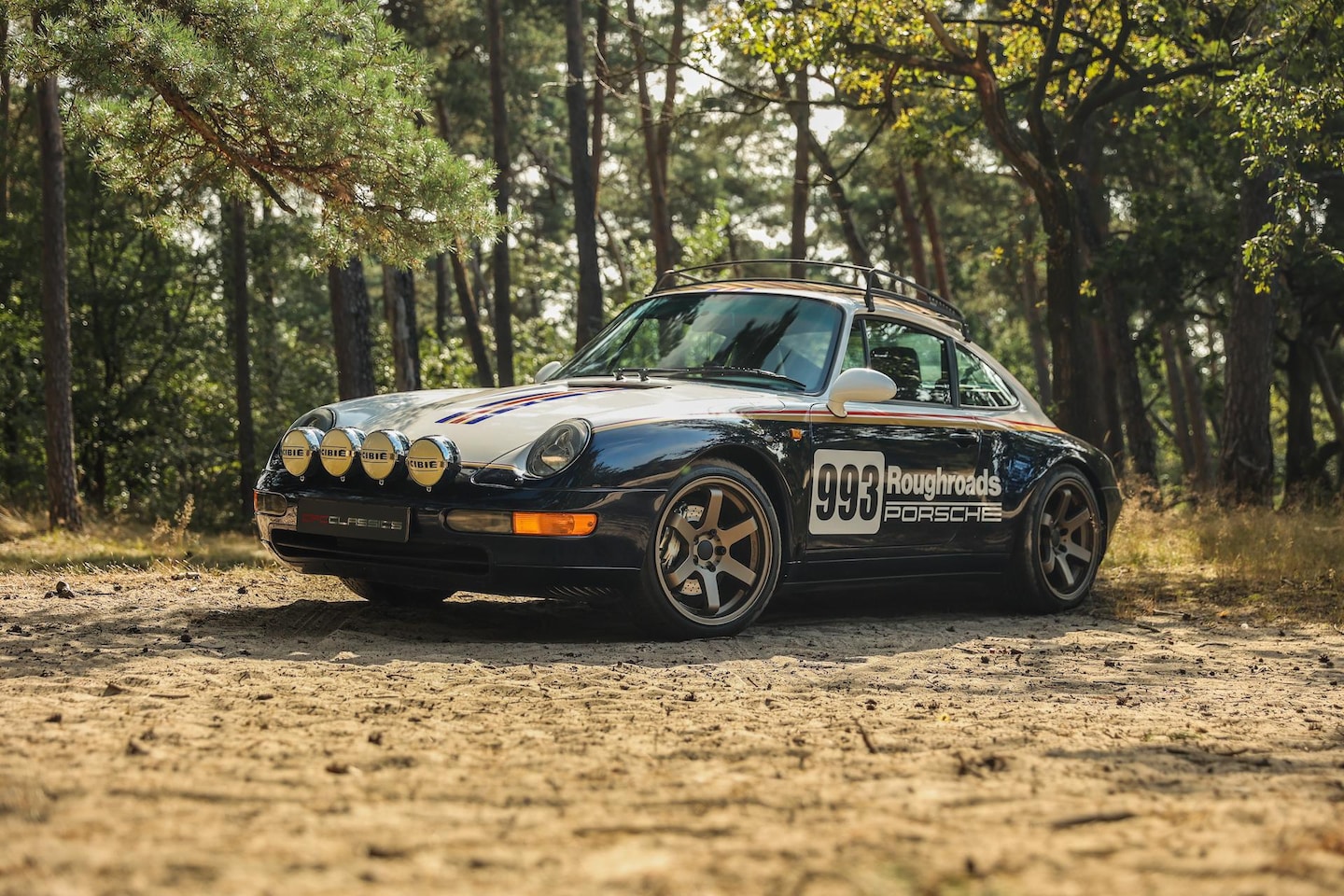 Porsche 911 - 993 3.6 Carrera 4 Coupé 'Roughroads' - AutoWereld.nl