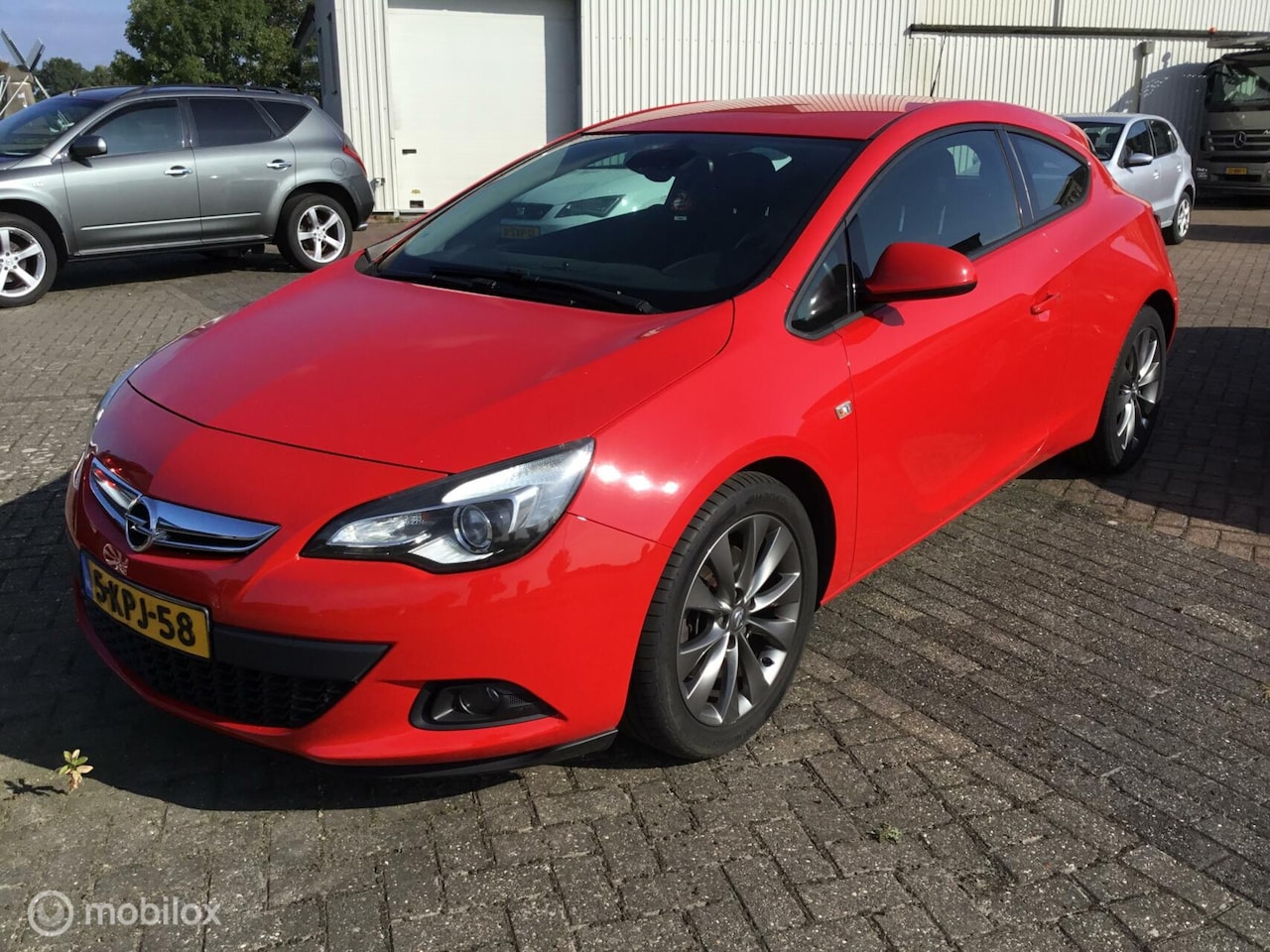 Opel Astra GTC - 1.7 CDTi Design Edition 1.7 CDTi Design Edition - AutoWereld.nl