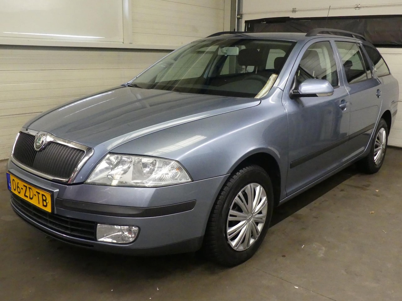 Skoda Octavia Combi - 1.6 Amb - Airco - Cruise Control - Trekhaak - AutoWereld.nl