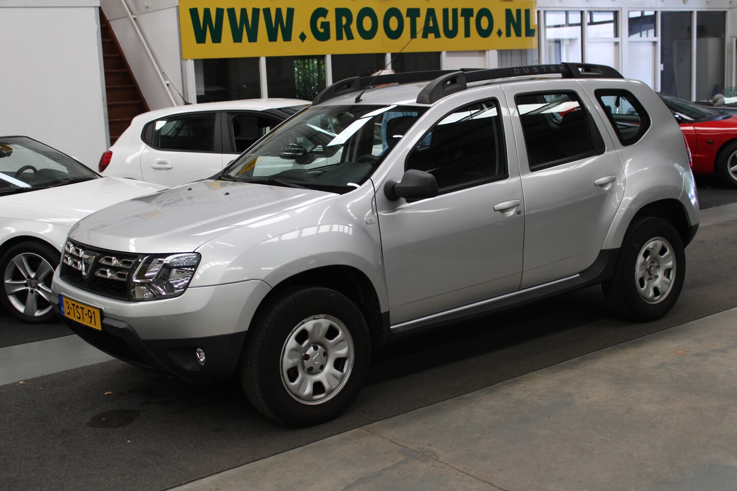 Dacia Duster - 1.2 TCe 4x2 Lauréate Airco, Cruise Control, Trekhaak, Stuurbekrachtiging - AutoWereld.nl