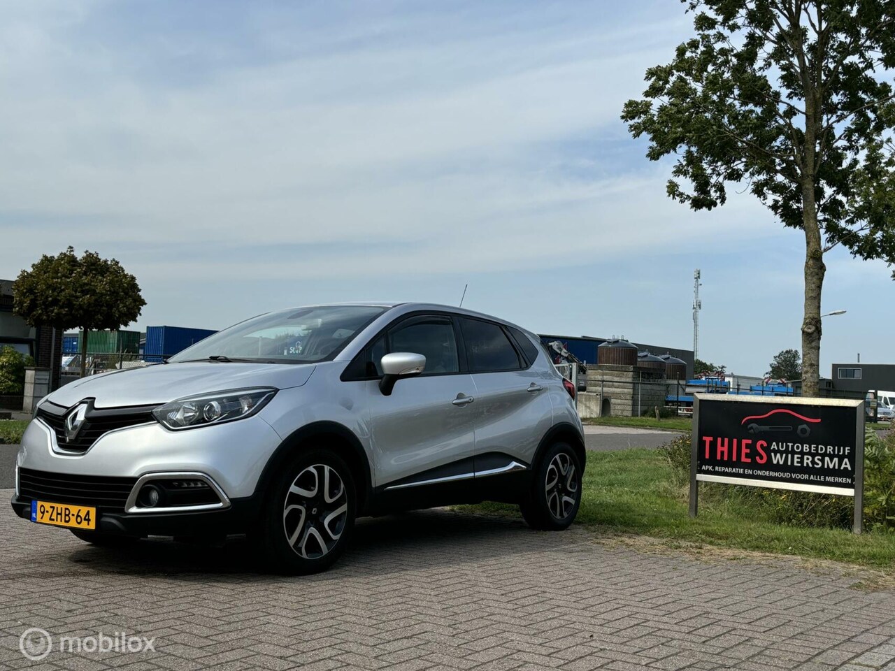 Renault Captur - 0.9 TCe Helly Hansen cruise/keyles/trekhaak/navi/ - AutoWereld.nl