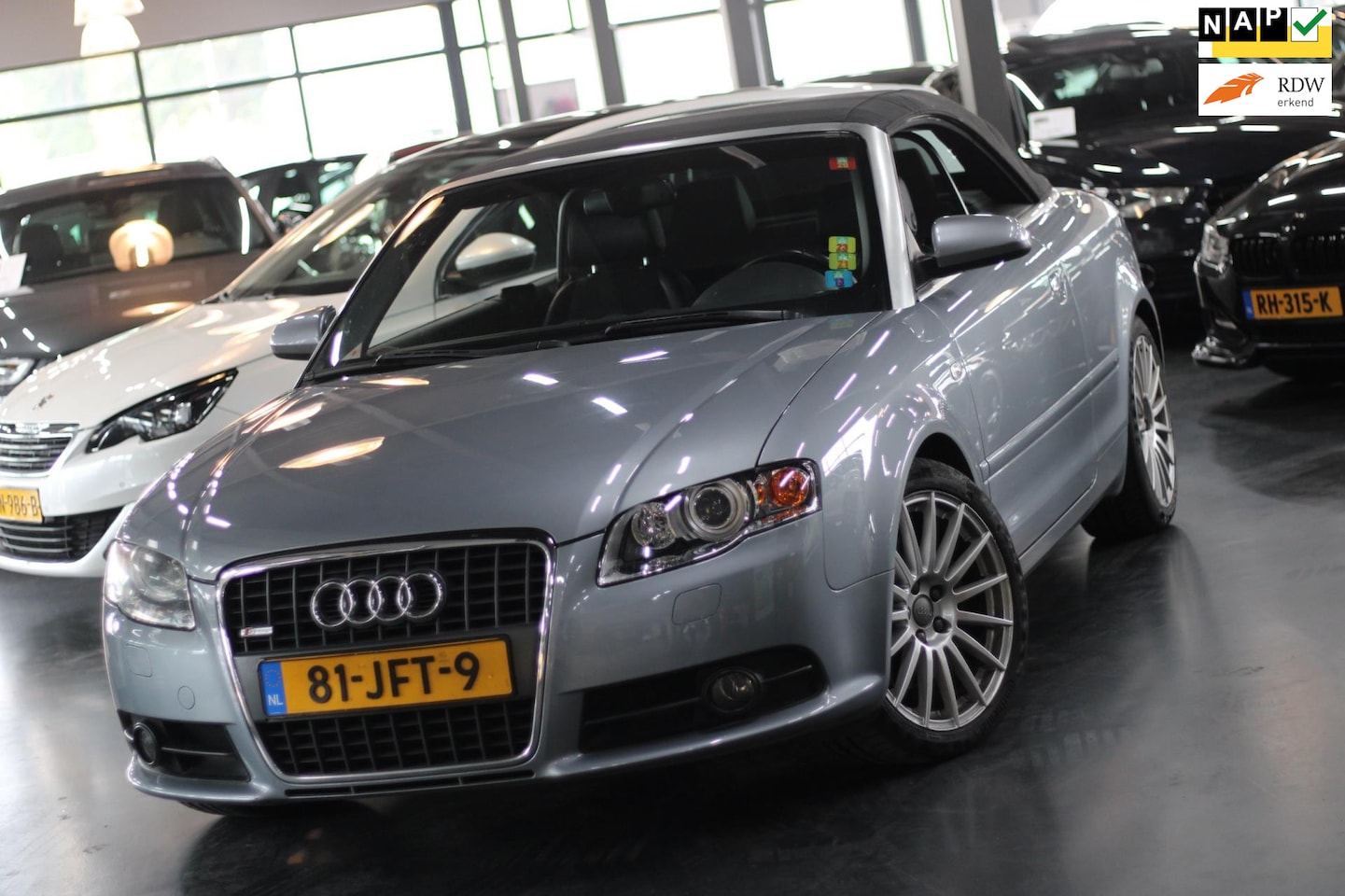 Audi A4 Cabriolet - 3.2 FSI quattro|XENON|STLVRWRMNG|DEALERONDERHOUDEN|V6| - AutoWereld.nl