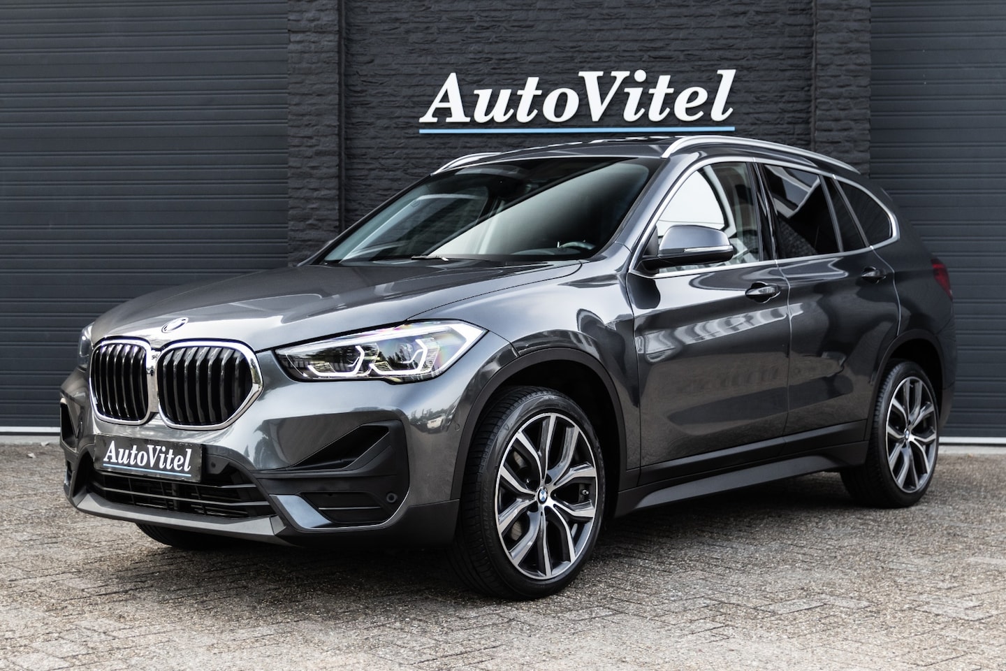 BMW X1 - sDrive18i Steptronic | Panodak | Sportleder | Achteruitrijcamera | PDC | LED - AutoWereld.nl