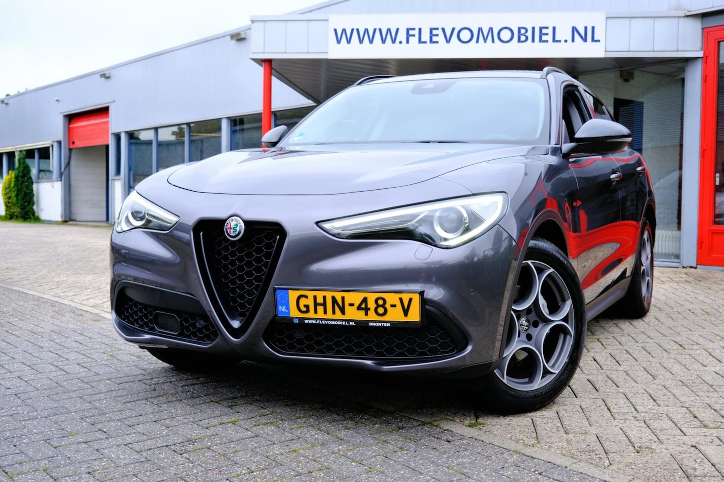 Alfa Romeo Stelvio - 2.2 JTD 161pk B-Tech Aut.Xenon|Half Leder|Navi|LMV|Cam - AutoWereld.nl