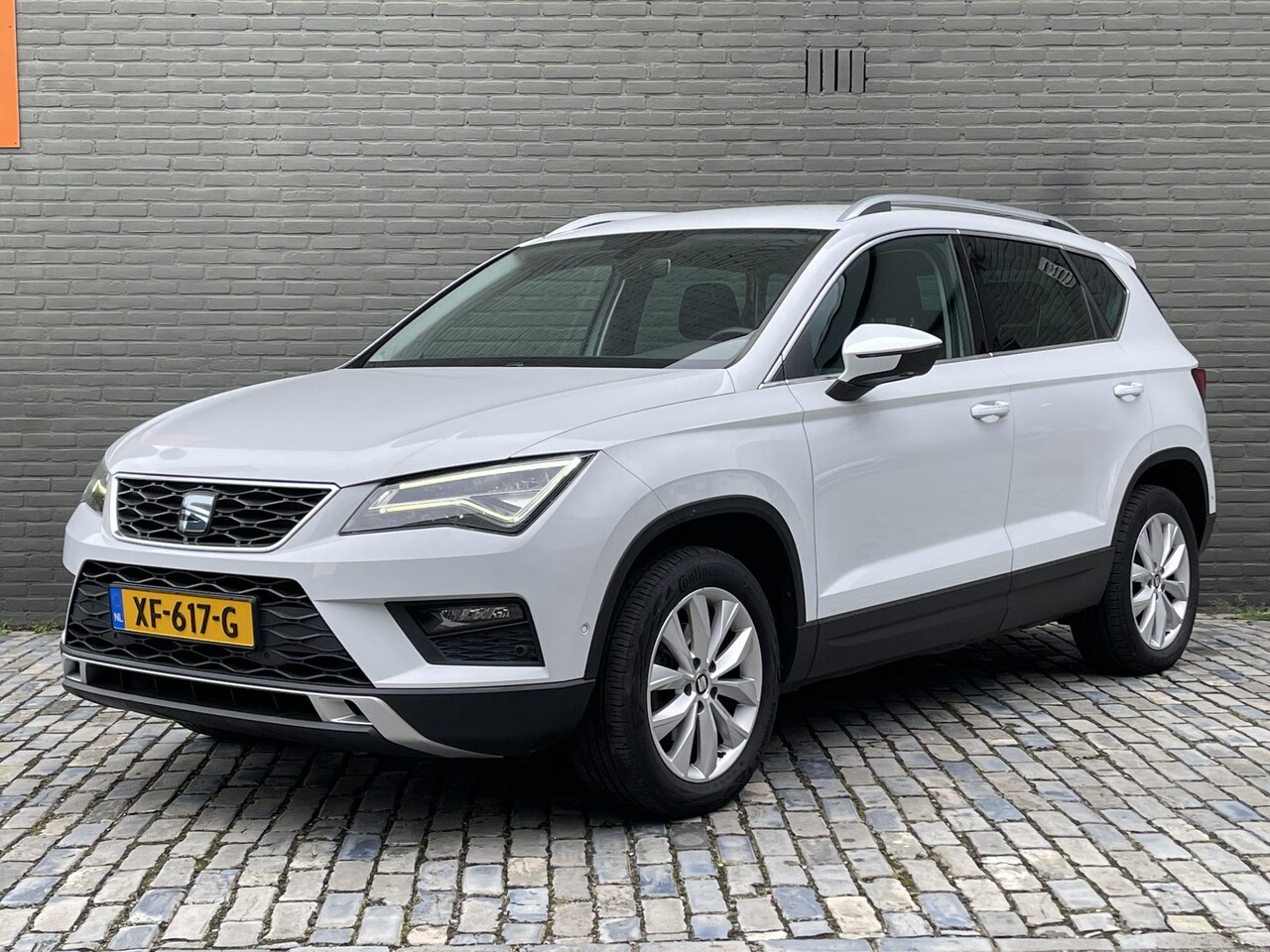 Seat Ateca - 1.0 ECOTSI STYLE BUSINESS INTENSE I APPLE/ANDROID I NAVIGATIE I PARKEERCAMERA I CRUISE CON - AutoWereld.nl