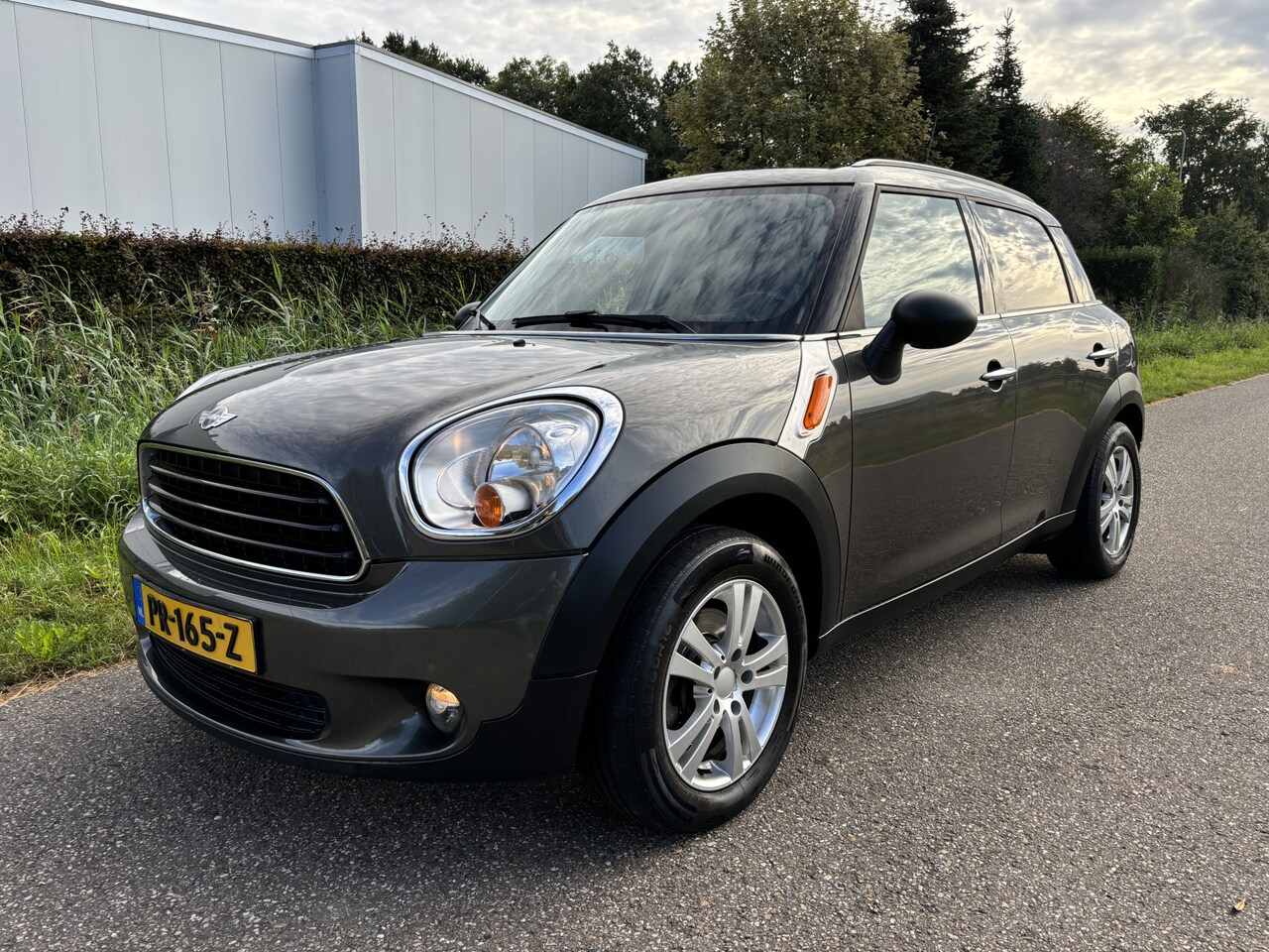 MINI Countryman - Mini 1.6 One Carver / AUTOMAAT / AIRCO / NAVI / CRUISE - AutoWereld.nl