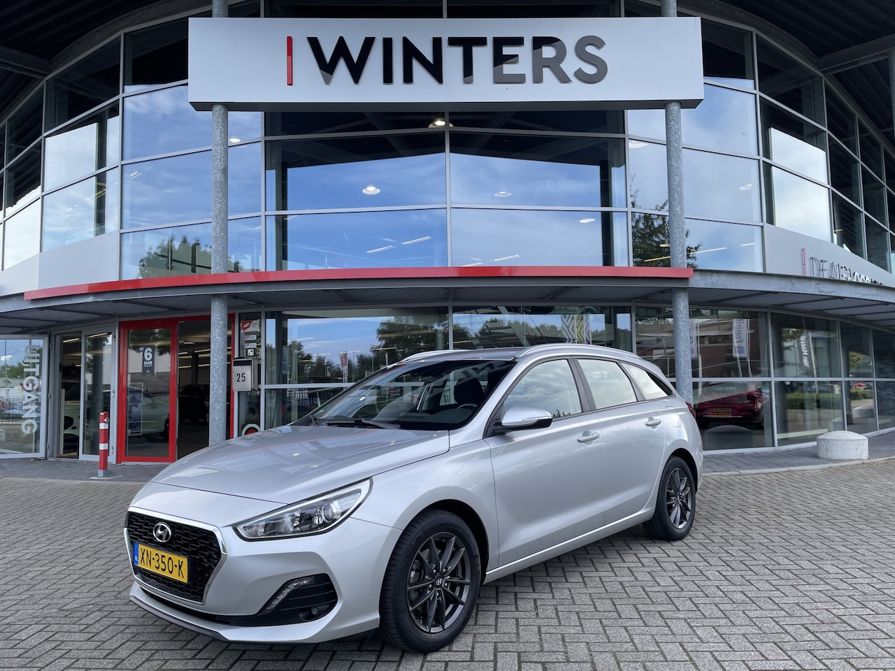 Hyundai i30 Wagon - 1.0 T-GDI Comfort 16" LMV Navi+BT+Cam Cr. Control DAB PDC - AutoWereld.nl