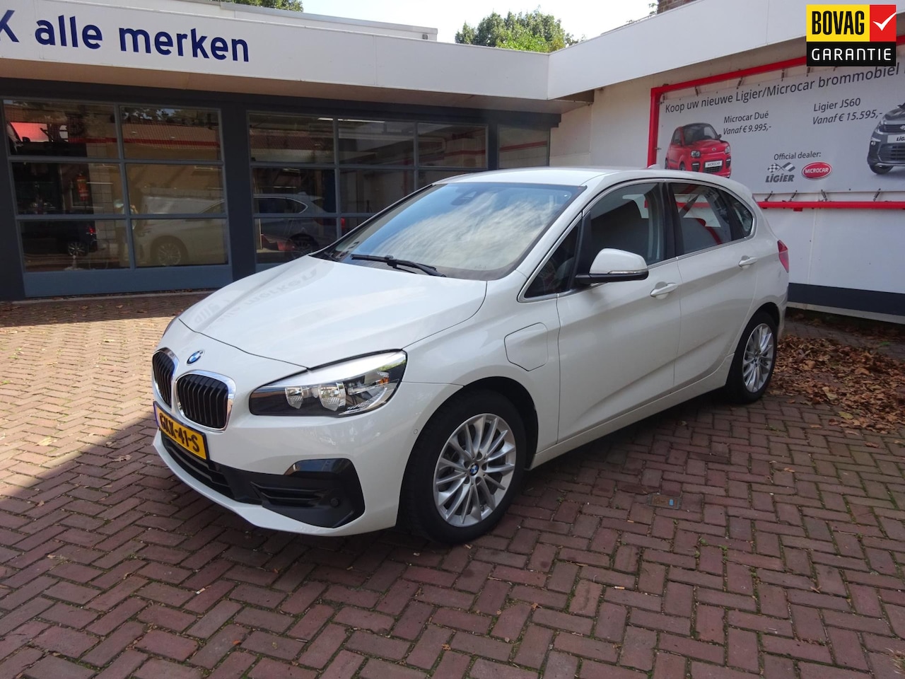 BMW 2-serie Active Tourer - 225xe iPerformance Hybrid Navigatie /17"LMV/Parkeersensoren V+A/Climate Control/Cruise Con - AutoWereld.nl