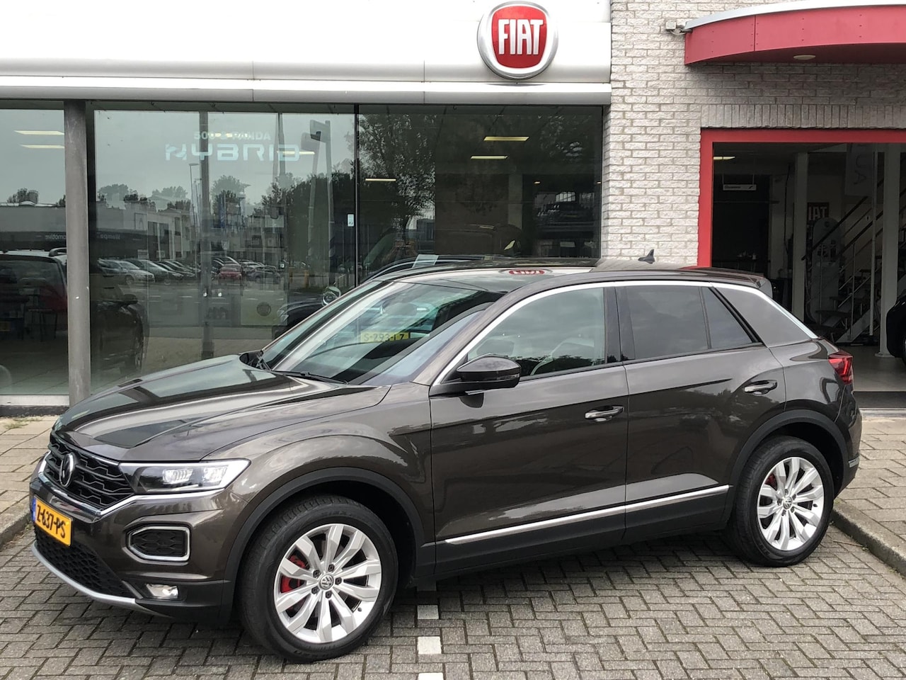 Volkswagen T-Roc - 1.5 TSI Sport DSG AUTOMAAT|NAVI|CLIMATE|APPLE/ANDROID|WINTERPACK|17" - AutoWereld.nl