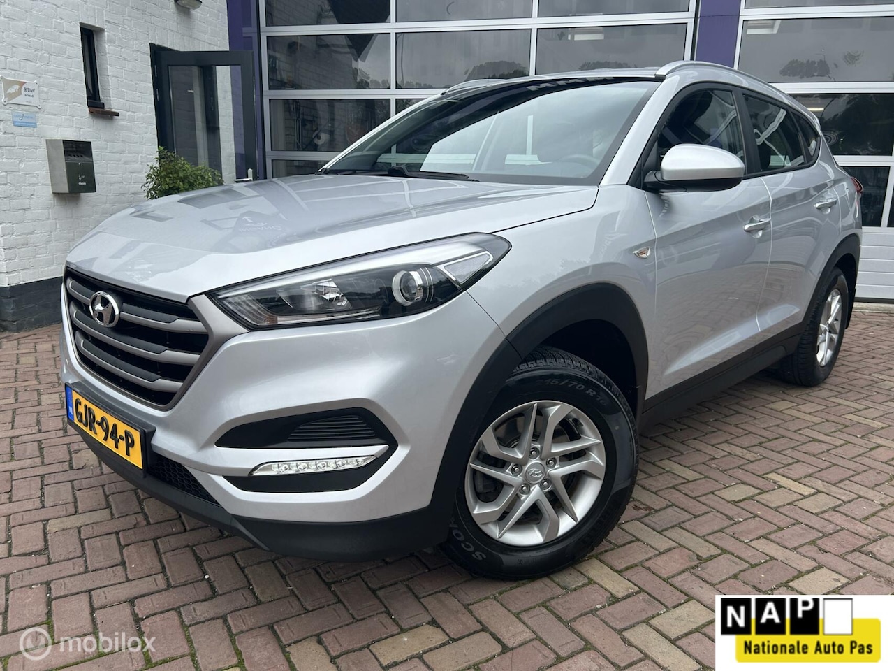 Hyundai Tucson - 1.6 GDi i-Drive * AIRCO * PDC * TREKHAAK - AutoWereld.nl