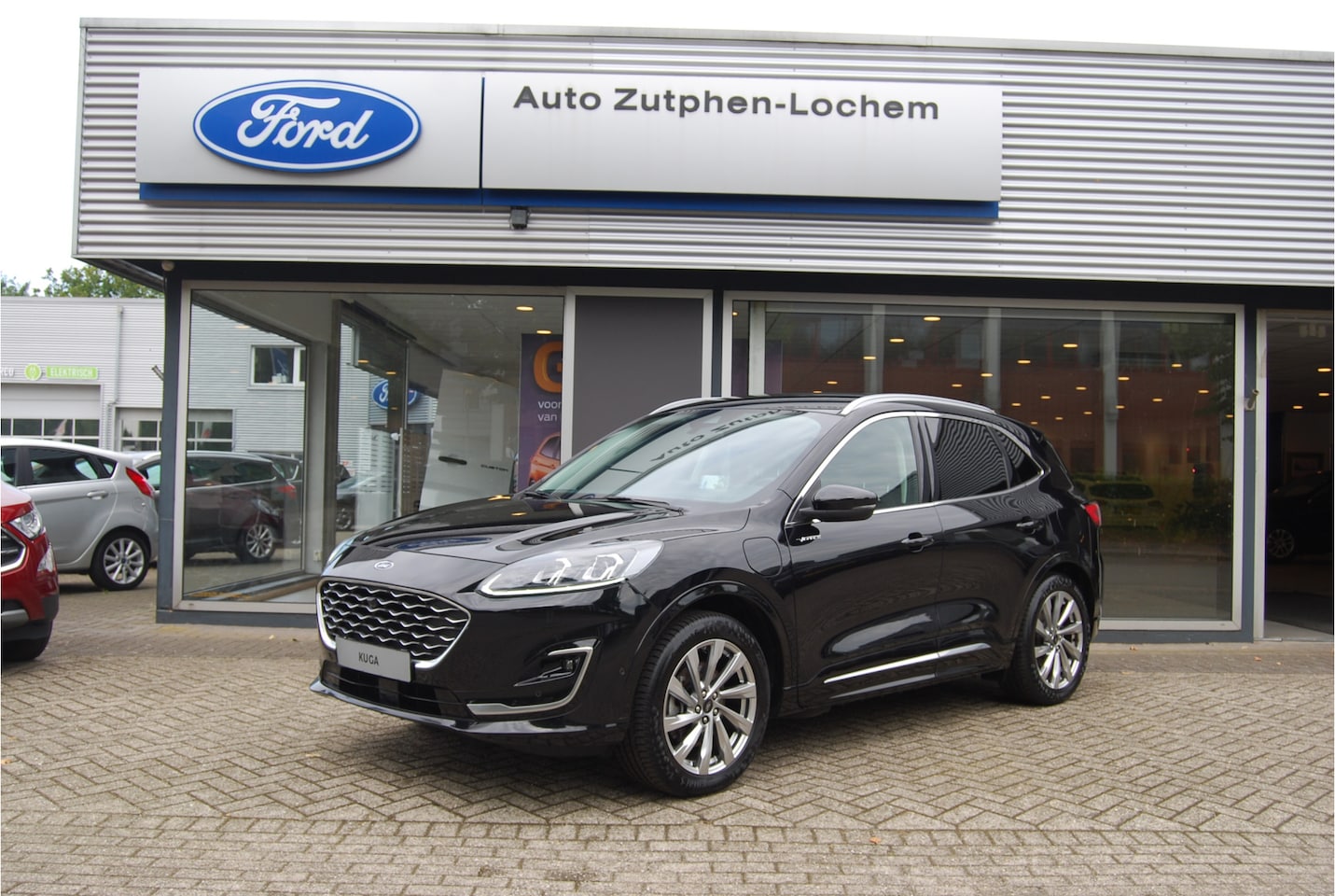 Ford Kuga - 2.5 PHEV 225PK Vignale TREKHAAK 1500KG | LEDER | MEMORY STOEL | ADAPTIVE CRUISE| WINTERPAC - AutoWereld.nl