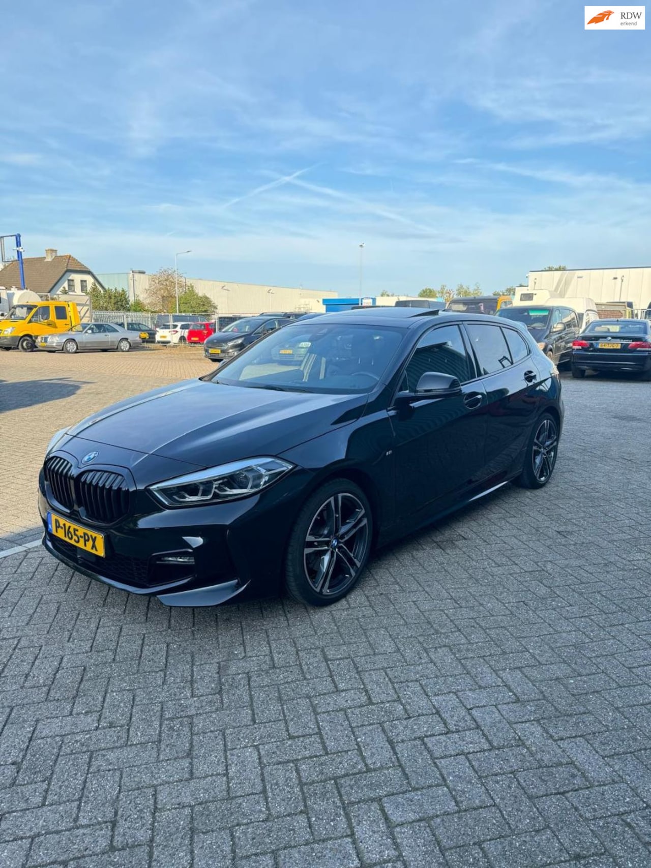 BMW 1-serie - 118i Executive M Sport Shadow Line Panoramadak - AutoWereld.nl