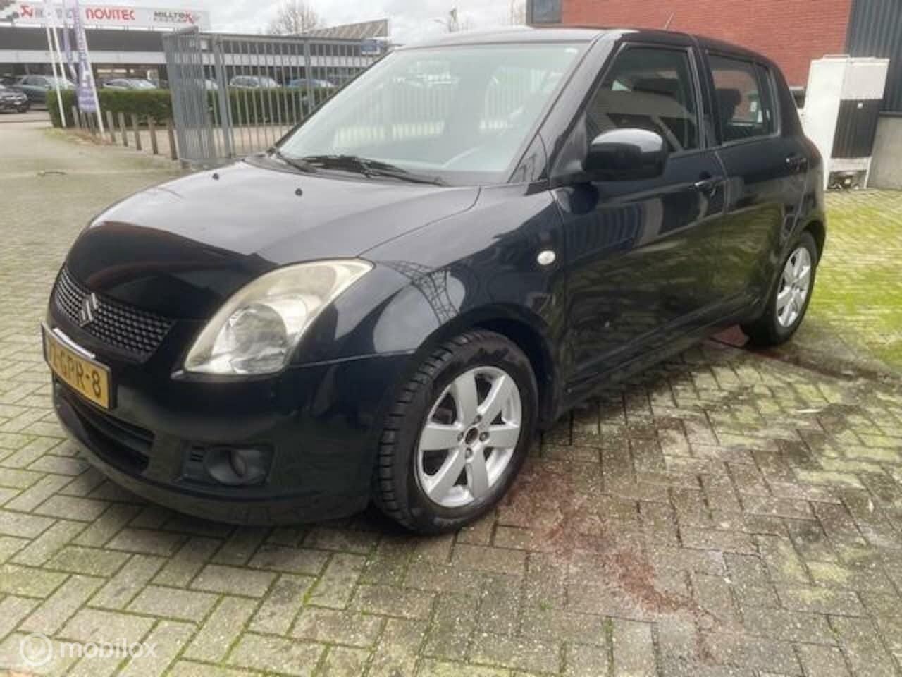 Suzuki Swift - 1.3 Shogun 1.3 Shogun - AutoWereld.nl