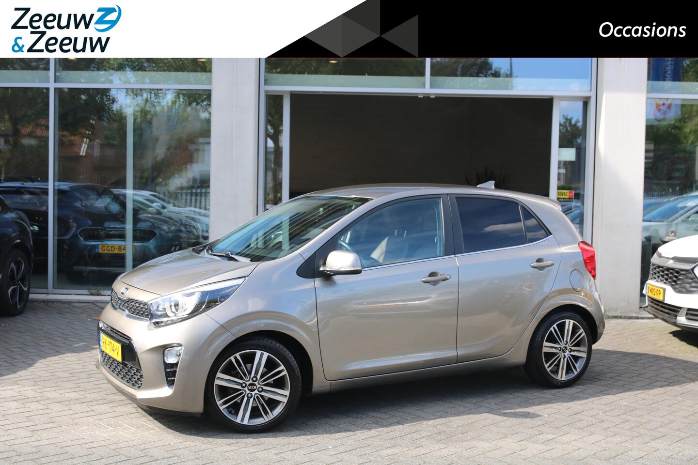 Kia Picanto - 1.0 CVVT Design Edition | Airco | Navi | Camera | Leder | LM Velgen | Privacy Glass | - AutoWereld.nl