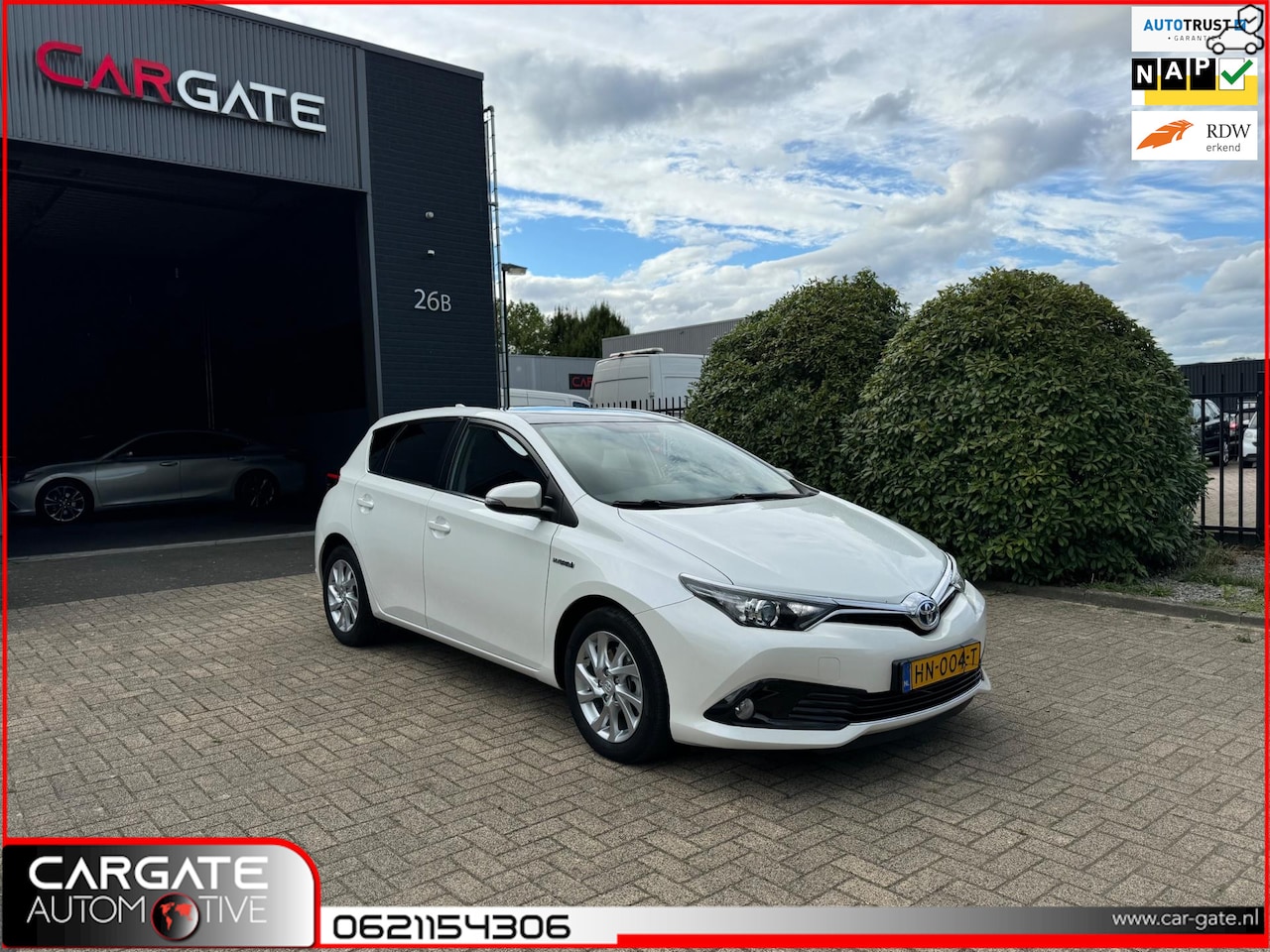 Toyota Auris - 1.8 Hybrid|Panorama|Nap|Apk|Cruise|Clima|Facelift - AutoWereld.nl