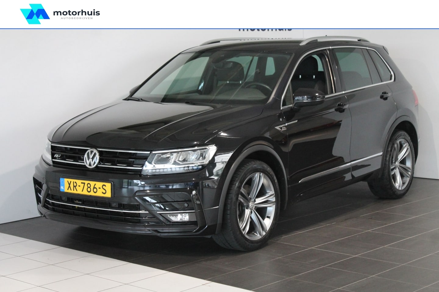 Volkswagen Tiguan - 1.5 TSI 130PK BUSINESS R-LINE VIRTUAL NAVI PDC LED NAP - AutoWereld.nl