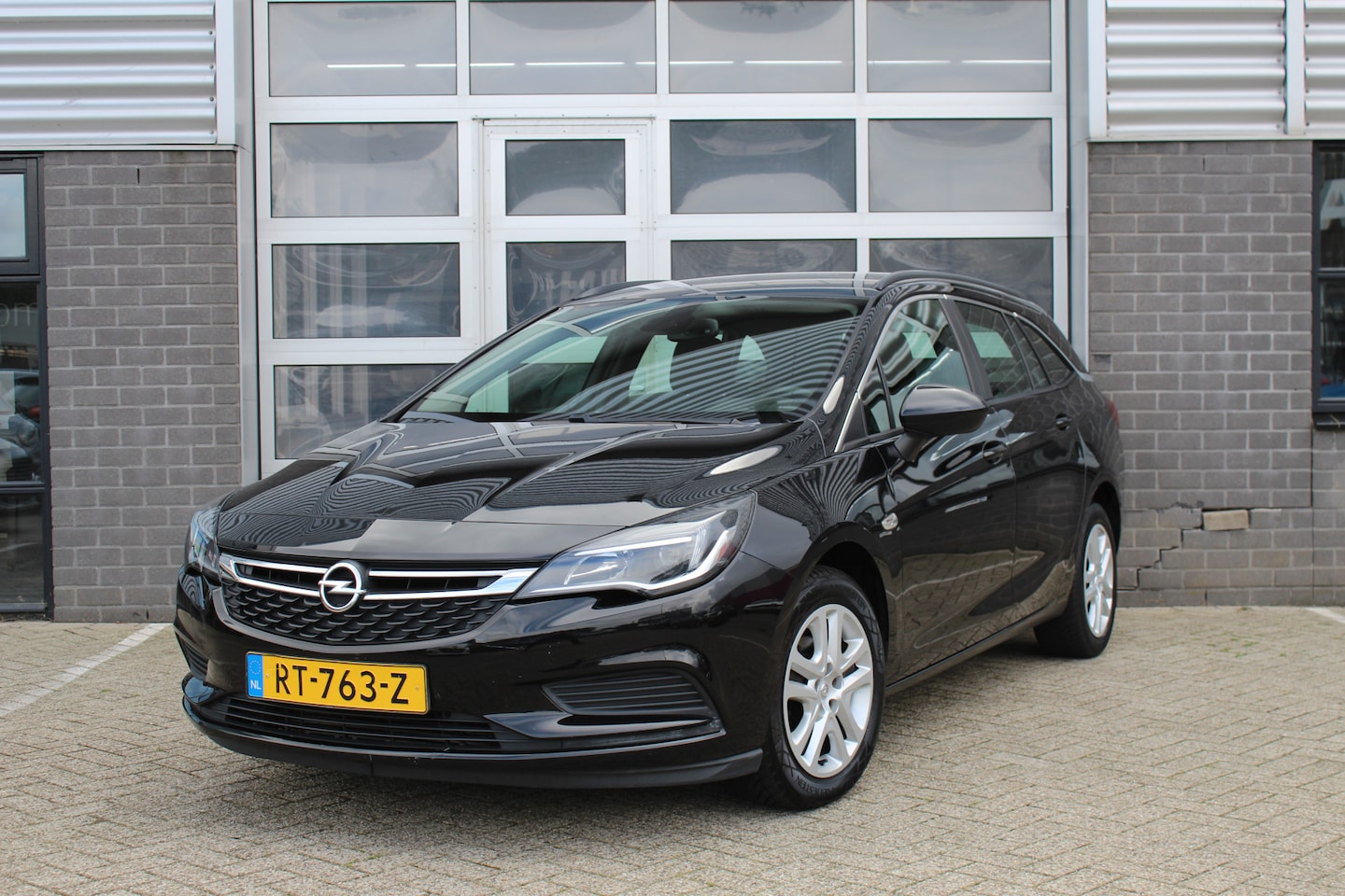 Opel Astra Sports Tourer - 1.4 Turbo Business+ / Carplay / Cruise / N.A.P. - AutoWereld.nl