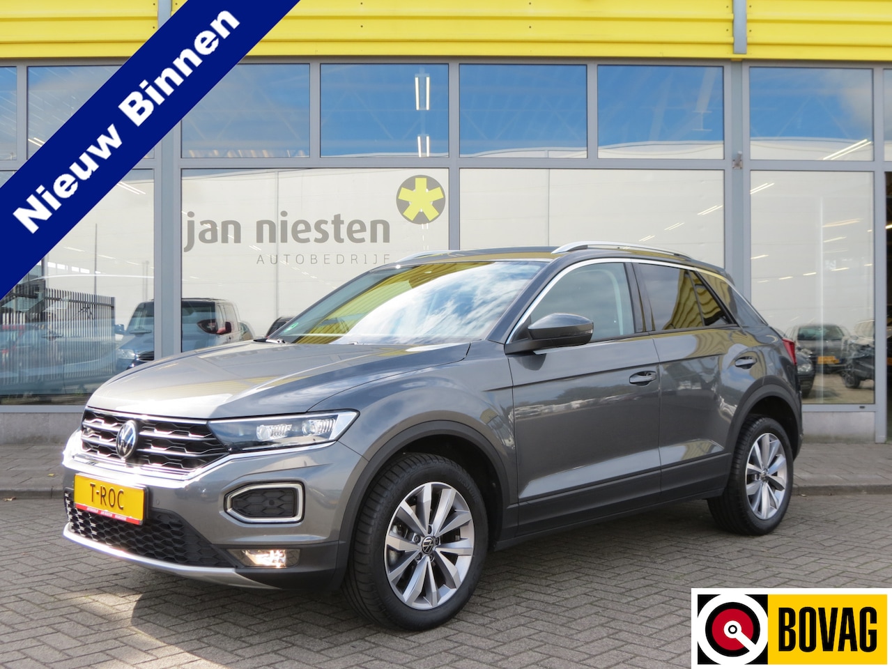 Volkswagen T-Roc - 1.5 TSI AUTOMAAT / STYLE / LED / NAVIGATIE / CAMERA - AutoWereld.nl