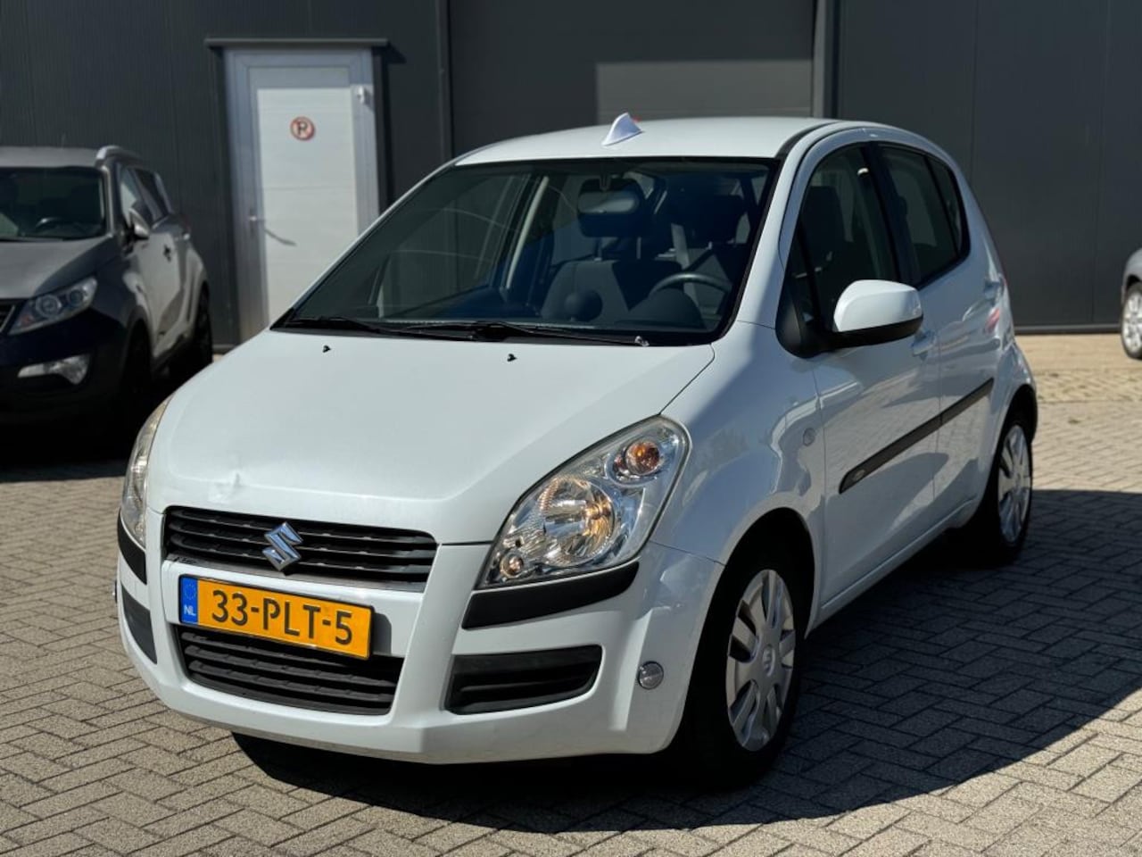 Suzuki Splash - 1.0 Spirit Airco 5 Deurs Kl Wit - AutoWereld.nl