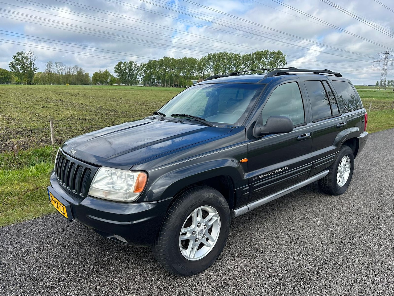 Jeep Grand Cherokee - 4.7i V8 Limited AIRCO ! - AutoWereld.nl