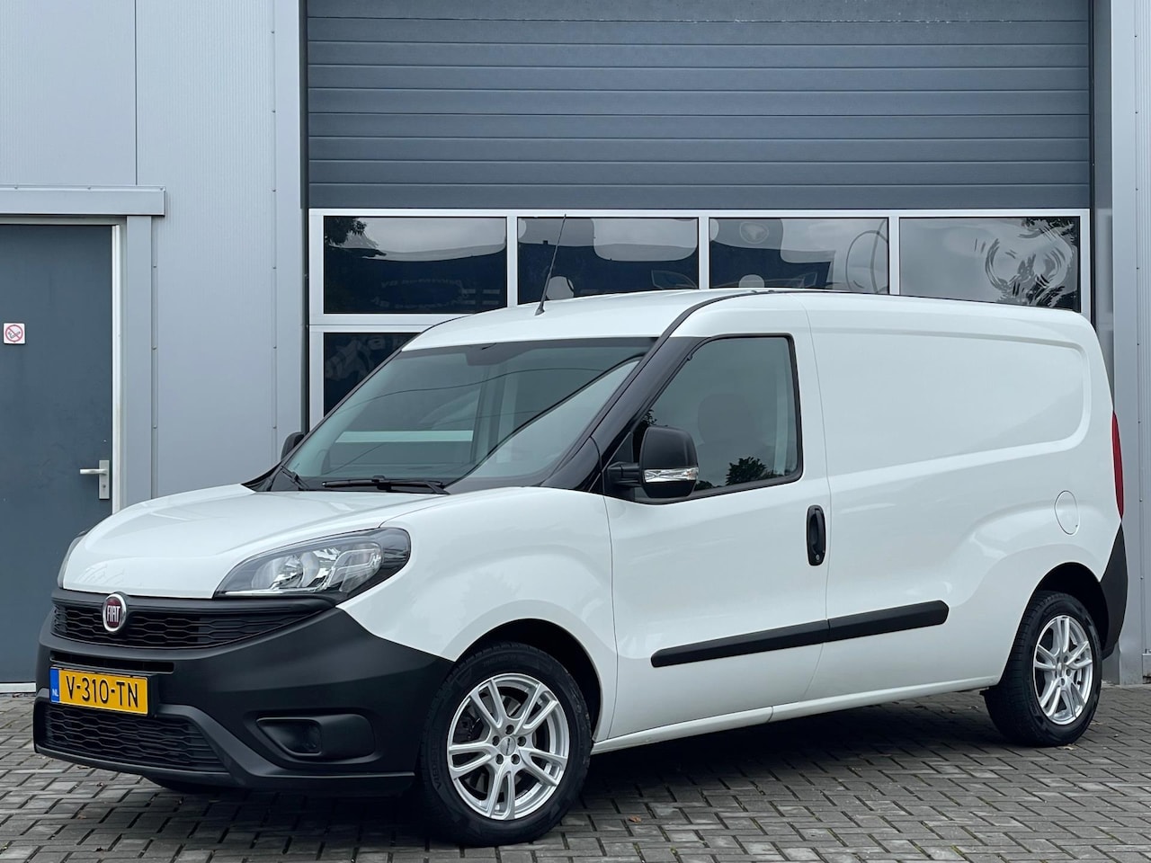 Fiat Doblò Cargo - 1.6 MJ L2H1 Maxi | Navi | Cruise control | Bluetooth | Trekhaak | Schuifdeur - AutoWereld.nl