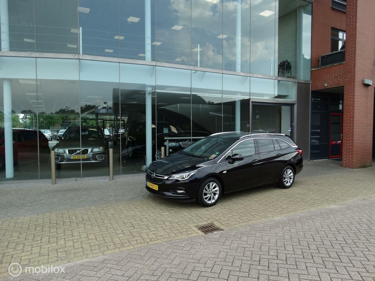 Opel Astra Sports Tourer - 1.4 150pk Executive 1e eigenaar - AutoWereld.nl