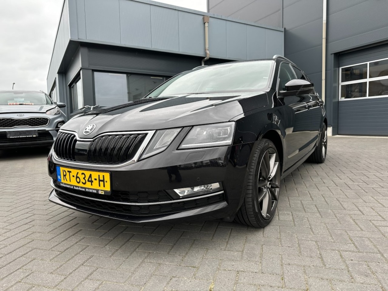 Skoda Octavia - 1.5 TSi Style Business Aut. Navi Leder Trekhaak - AutoWereld.nl