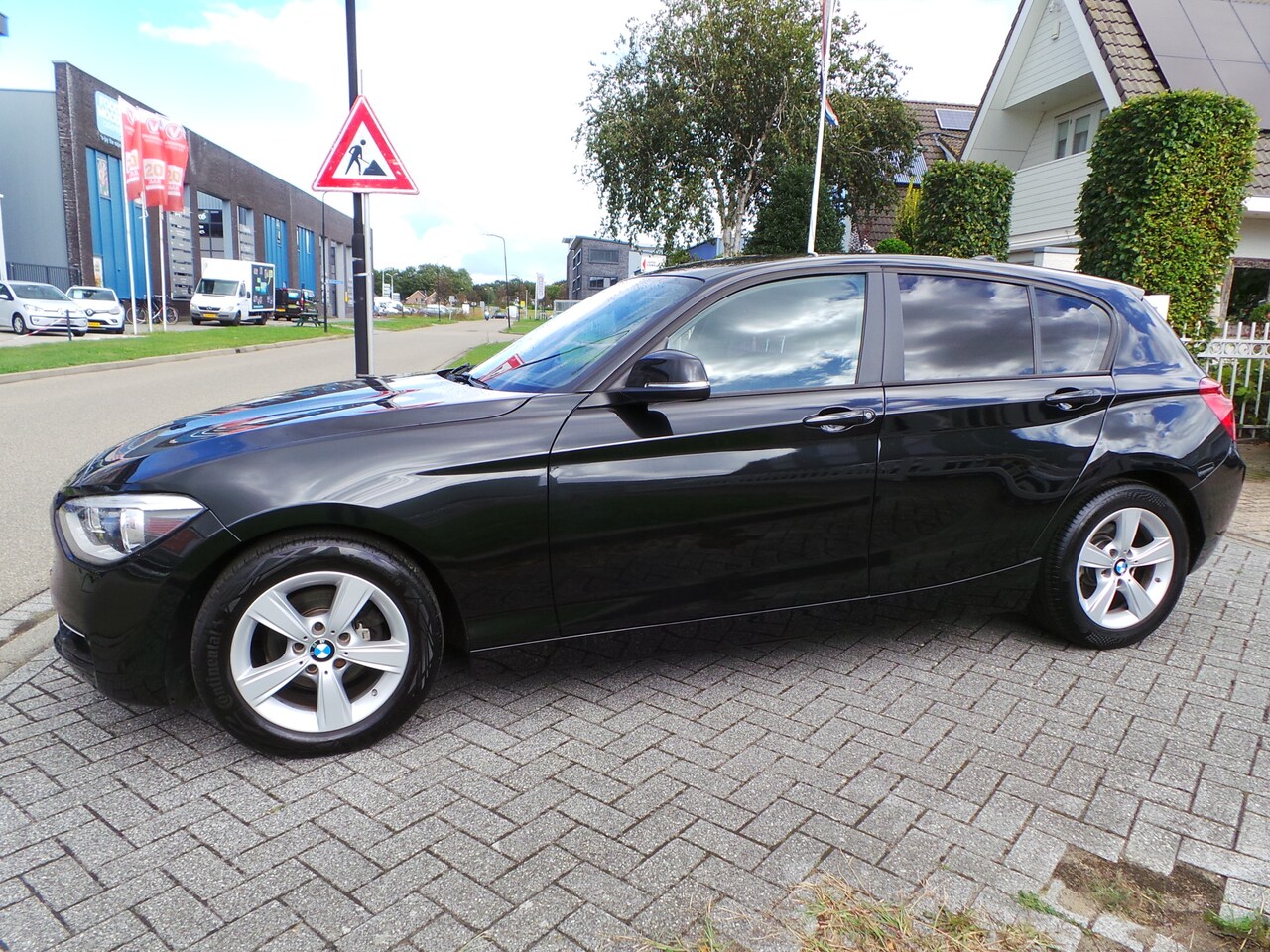 BMW 1-serie - 116d EDE Corporate Lease Executive Airco,Navi,Cruise,Sportstoelen,Pdc prijs is inclusief b - AutoWereld.nl