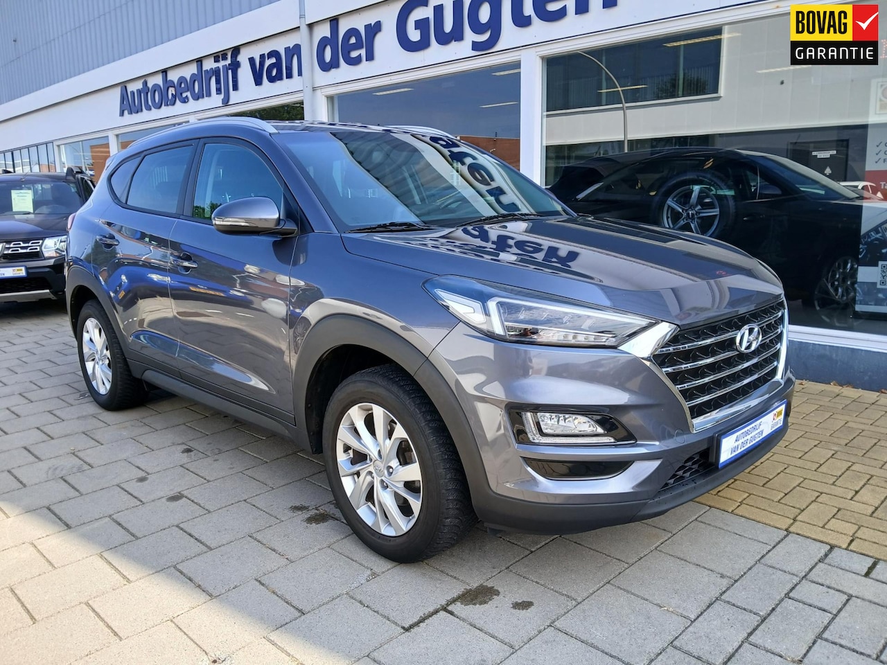 Hyundai Tucson - 1.6 GDi i-Drive / Stoelverwarming / Aut. Airco / - AutoWereld.nl