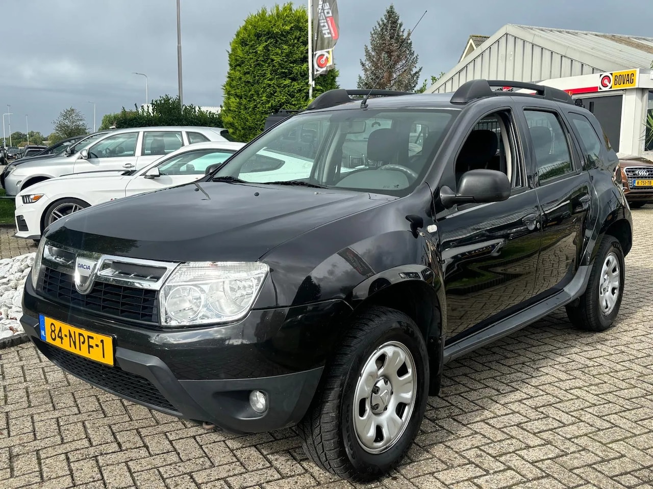 Dacia Duster - 1.6 Laureate 2WD 2010 LPG-G3 Trekhaak Zwart - AutoWereld.nl