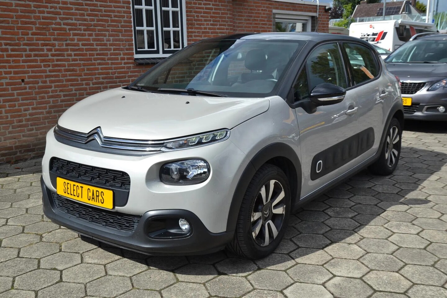 Citroën C3 Origin - 1.2 PureTech S&S Origins business automaat abs airco navi camera velgen cruise control vel - AutoWereld.nl