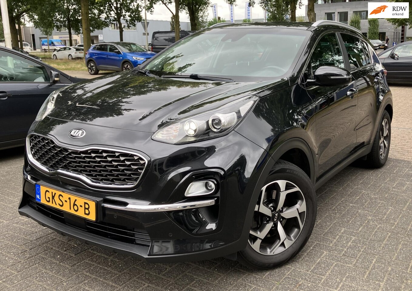 Kia Sportage - 1.6 GDI DynamicLine Navi Camera Half lederenbeklding L.m - AutoWereld.nl