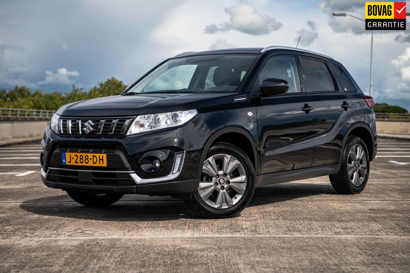 Suzuki Vitara - 1.0 112pk Boosterjet Select | Airco/Clima | Achteruitrijcamera | Cruise Control | Stoelver - AutoWereld.nl