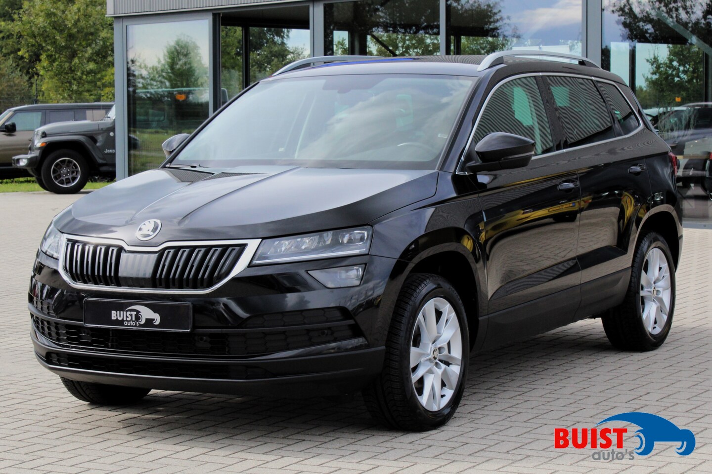 Skoda Karoq - 1.5 TSI ACT 150pk Style AUTOMAAT AD. CRUISE 64376KM! - AutoWereld.nl