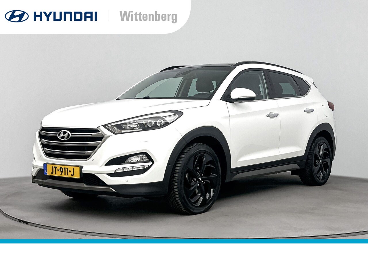 Hyundai Tucson - 1.6 T-GDi Premium 4WD Aut. | Panoramadak | Leer | Trekhaak | Trekgewicht 1600kg | Stoel + - AutoWereld.nl